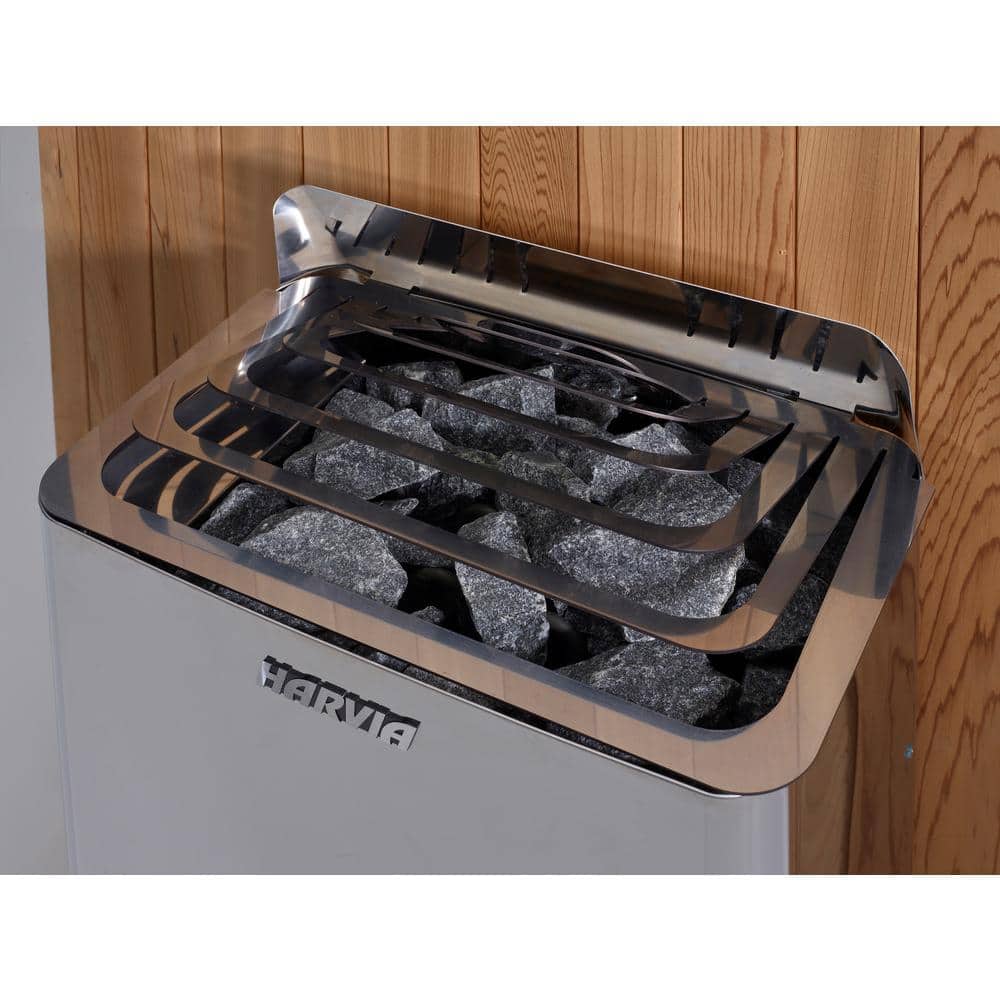 Traditional electric sauna heater and rocks inside a Golden Designs 3-person outdoor hemlock sauna.