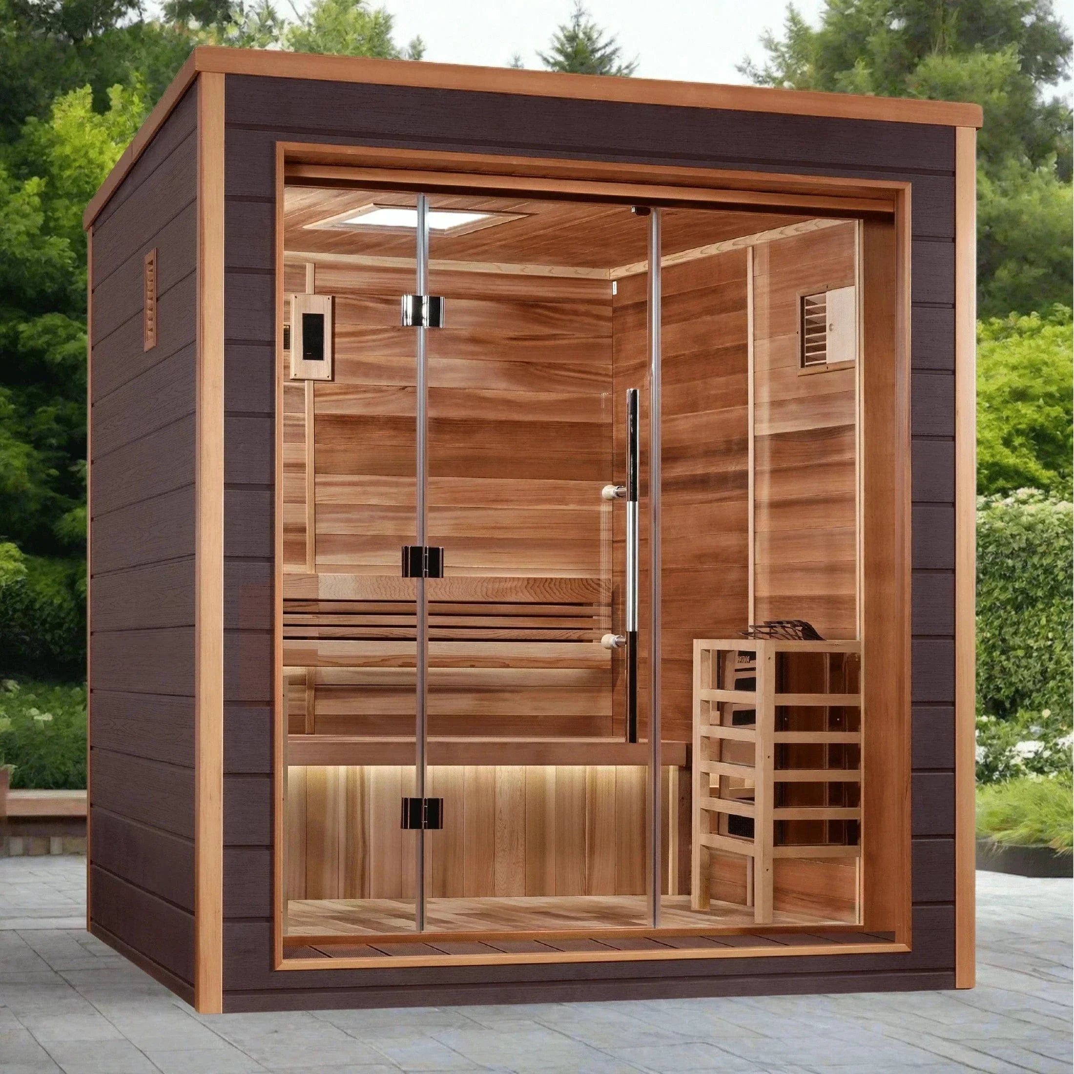 Golden Designs Drammen 3-person traditional outdoor sauna beautifully installed on a modern backyard stone patio next to a garden landscape.