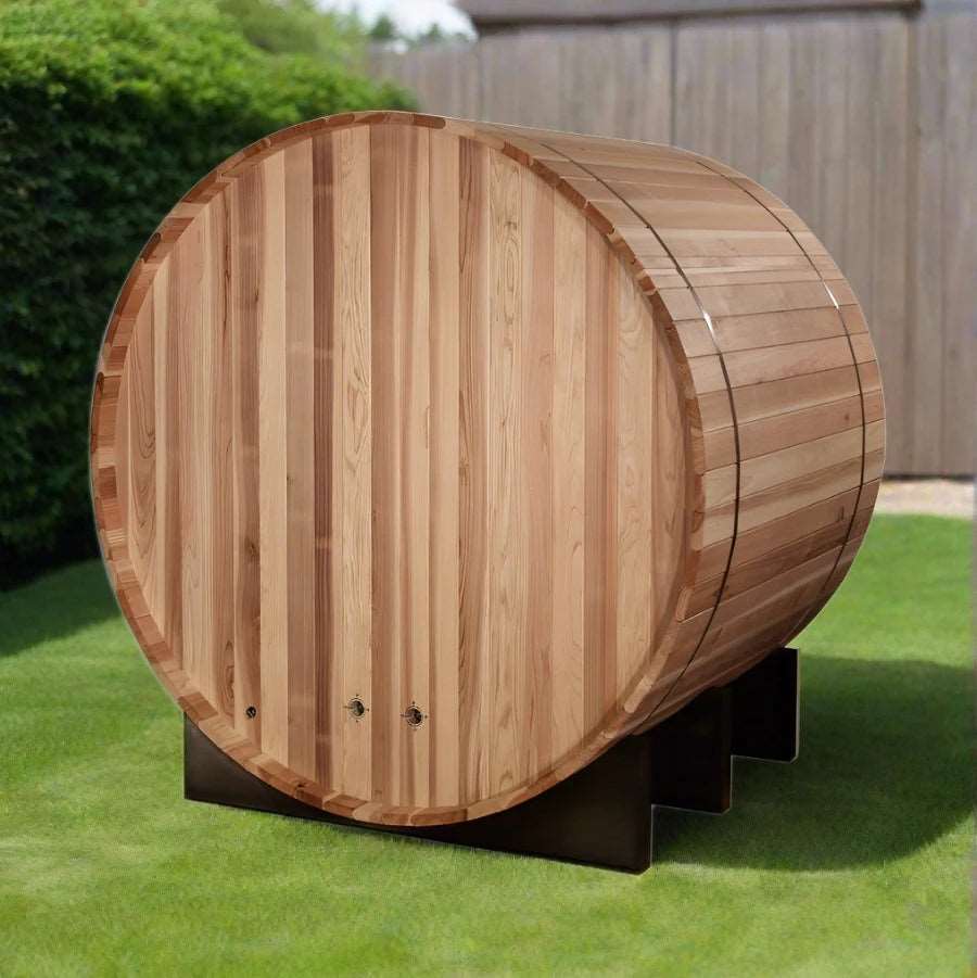 Two-person traditional barrel sauna St. Moritz by Golden Designs featuring cedar wood craftsmanship and outdoor spa design