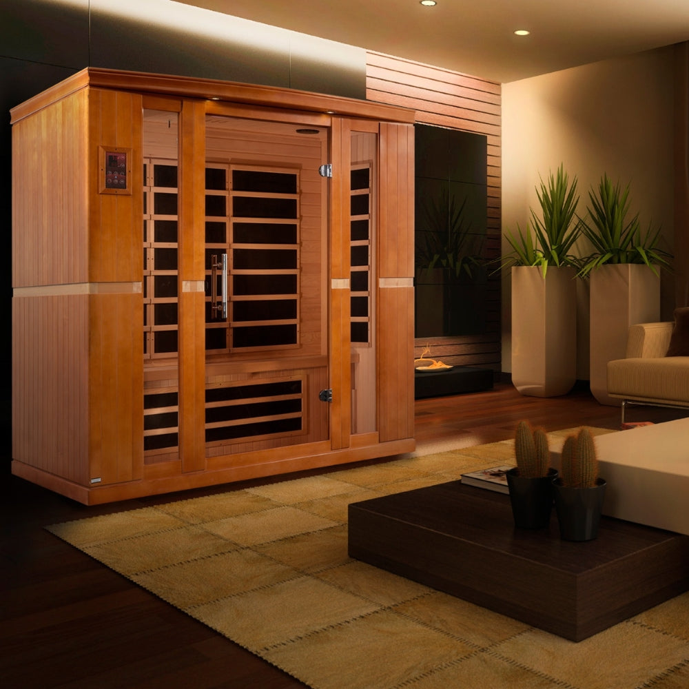 Person enjoying relaxation in Dynamic Bergamo 4-person infrared sauna with FAR infrared therapy for detox, stress relief, and muscle recovery