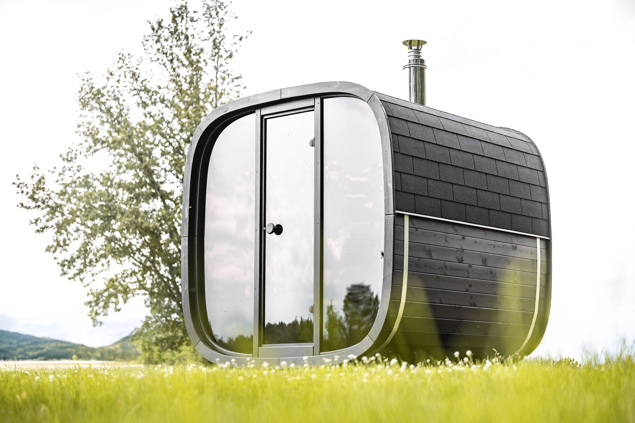 Leil Black Cube Comfort ThermoWood Outdoor Sauna for 6 People featuring Opposing Benches, Contemporary Black Exterior and Luxury Outdoor Spa Experience