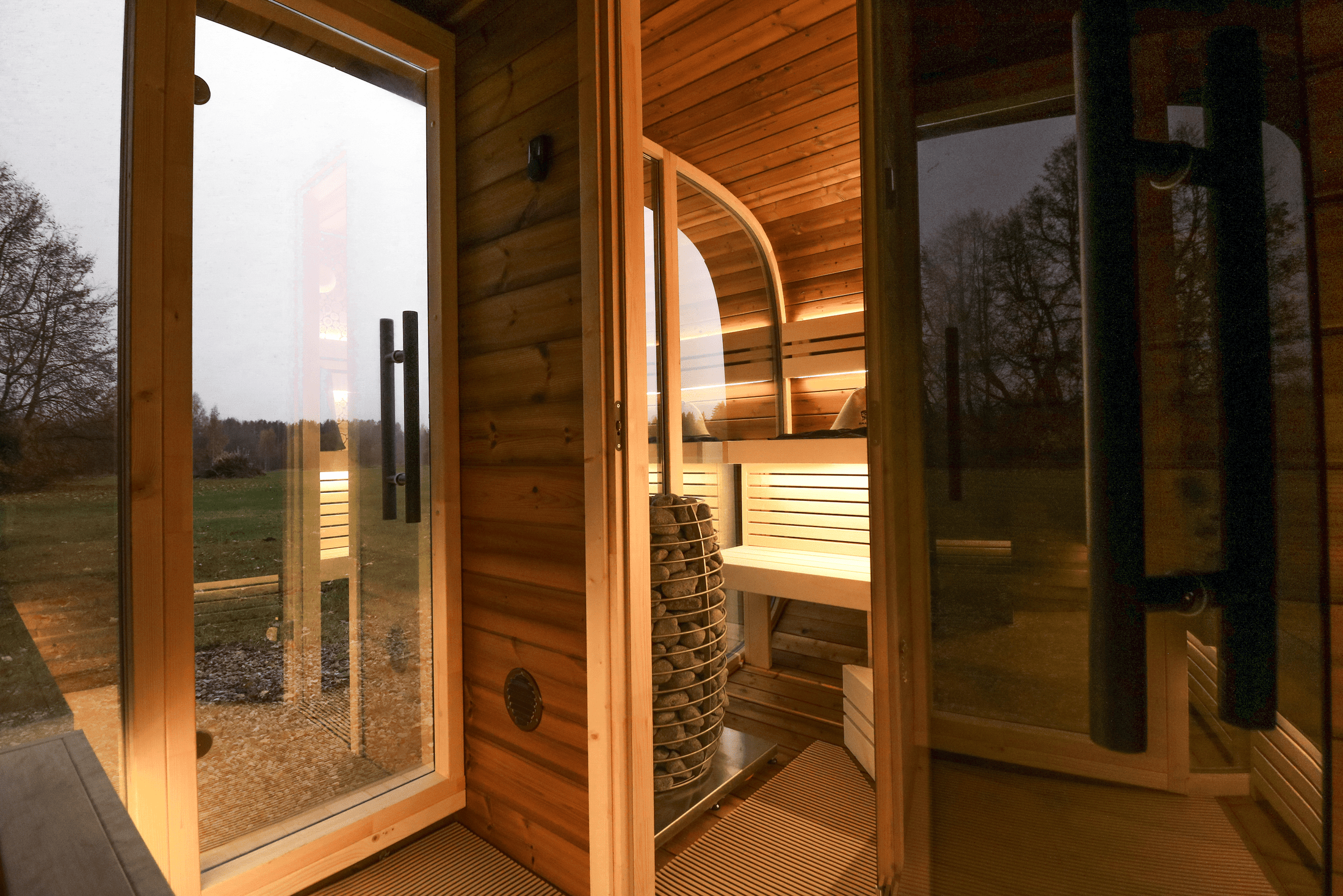 Leil Round Cube Double outdoor sauna with changing room for 5–6 people, premium ThermoWood garden sauna cabin for luxury home wellness relaxation