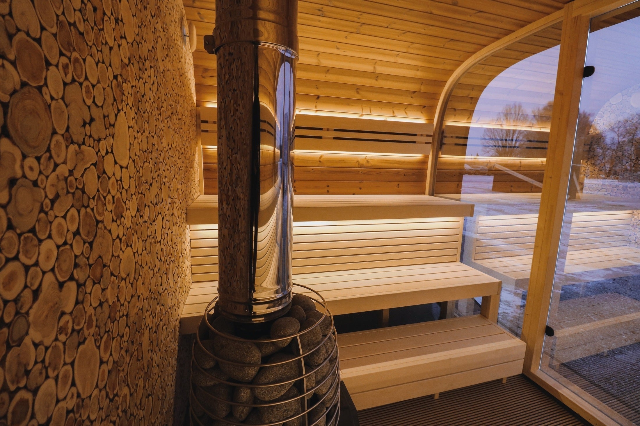 Leil Round Cube premium outdoor sauna for 6-8 users, ThermoWood® Nordic design, handcrafted Estonian backyard wellness cabin