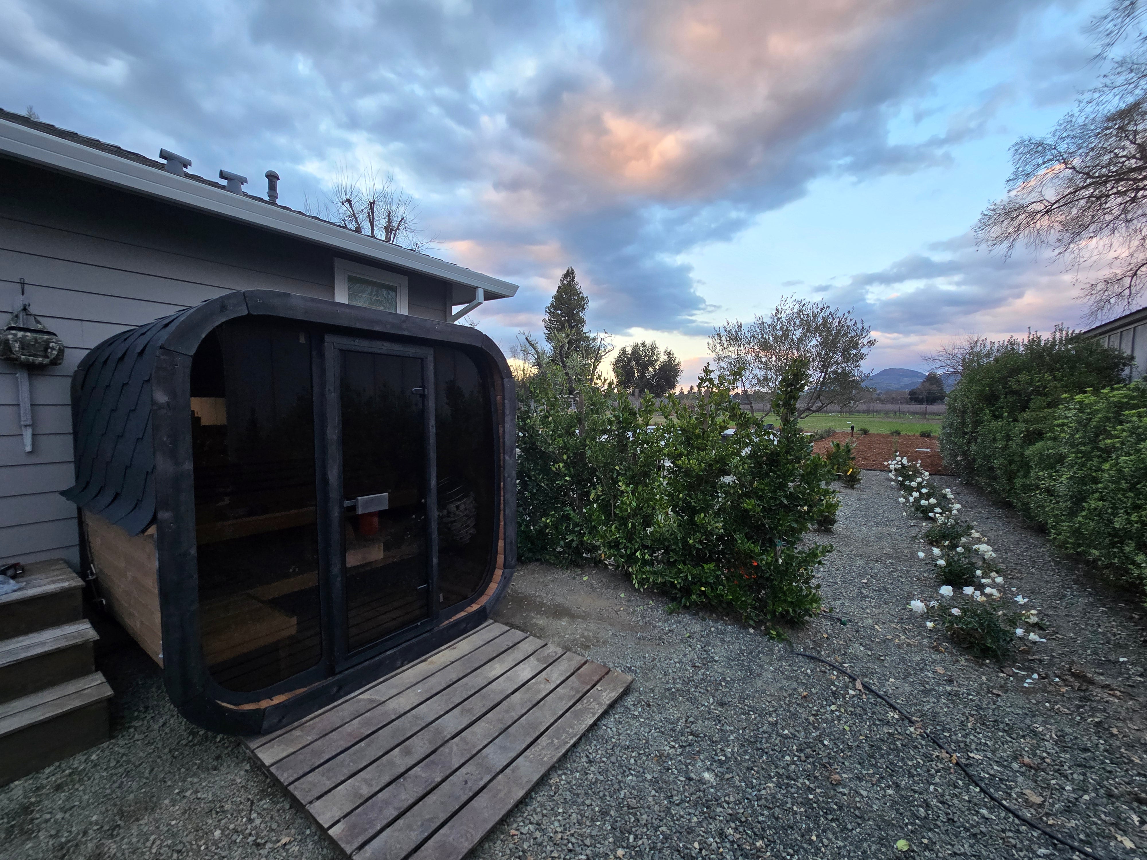 Luxury SaunaLife Cube CL5G Outdoor Home Sauna for 4 People with Full-Glass Front Wall and Contemporary Backyard Wellness Design