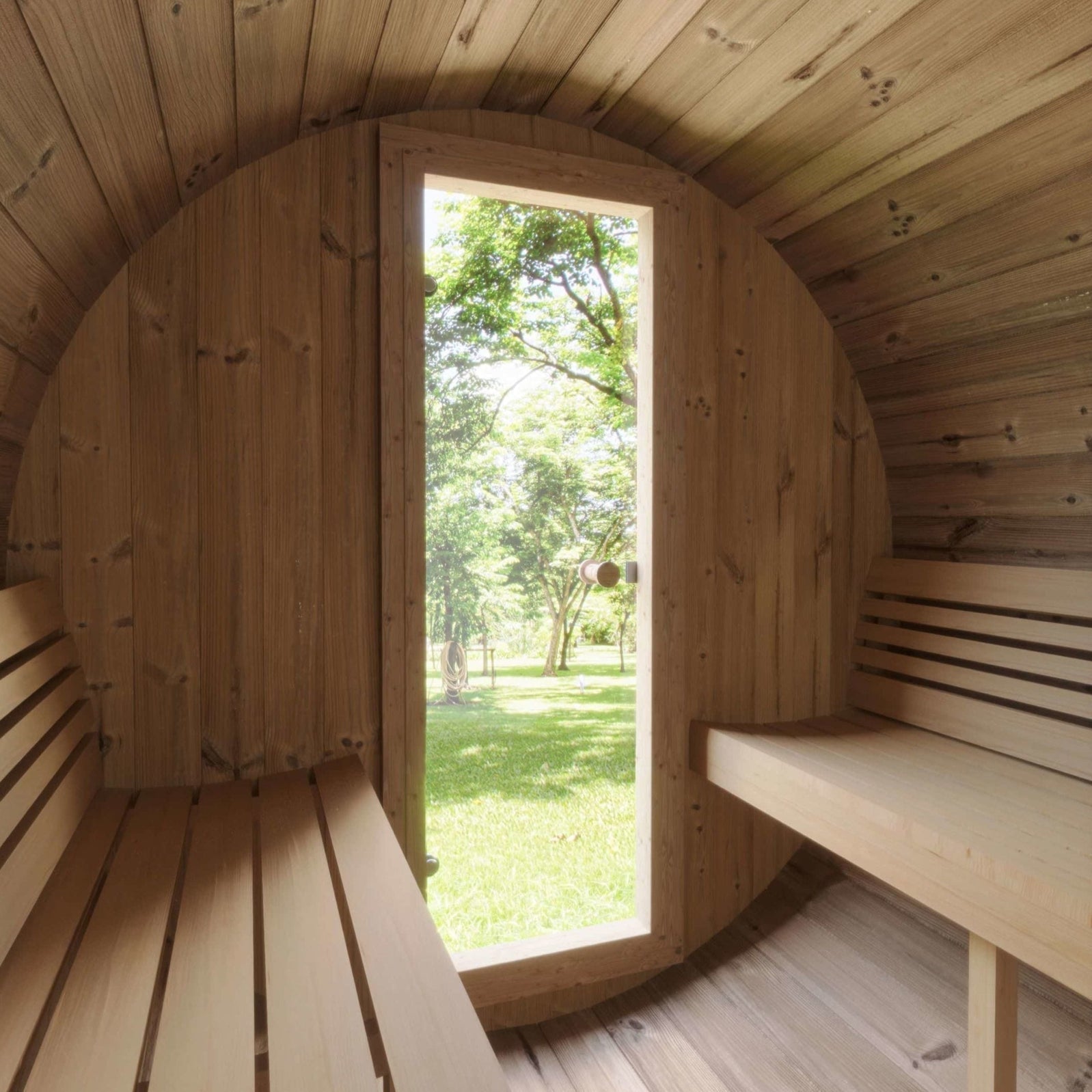 Outdoor SaunaLife Model E6W barrel sauna with panoramic window, ergonomic curved design, high-quality Nordic wood for luxury home spa experience