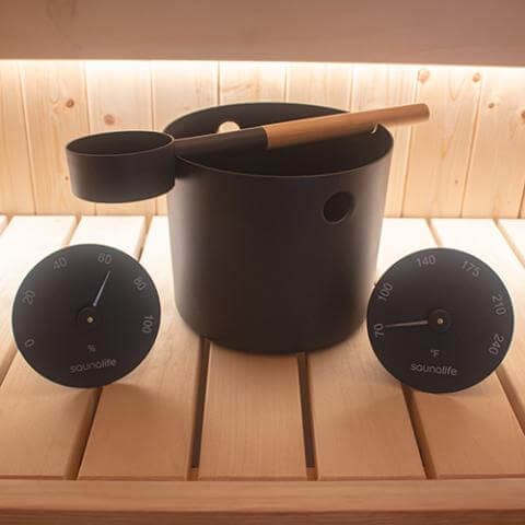sauna bucket with bamboo-handled ladle and matching black Fahrenheit thermometer