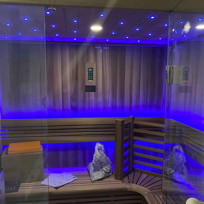 Home wellness sauna Golden Designs Copenhagen Edition 2025 with Harvia stove and premium red cedar interior for deep relaxation