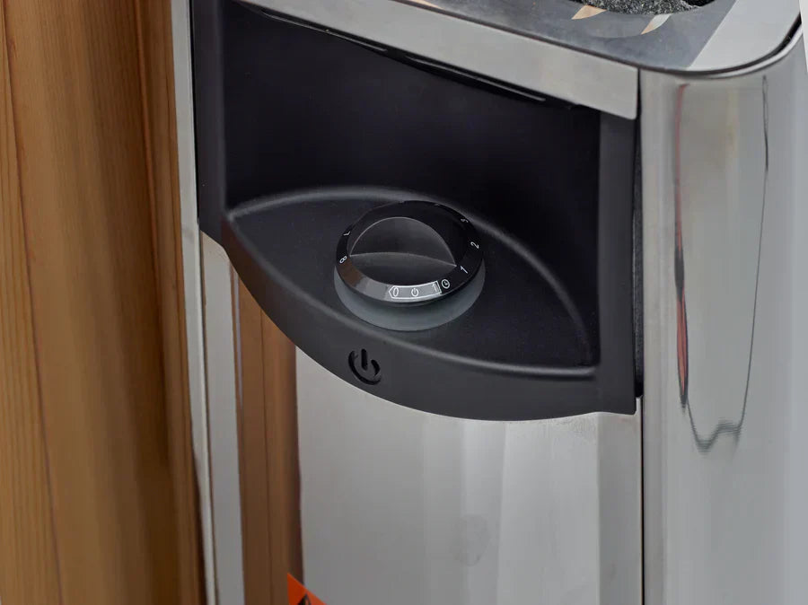 Dual heating system sauna featuring Harvia 6KW stove and full spectrum infrared PureTech emitters for hybrid performance