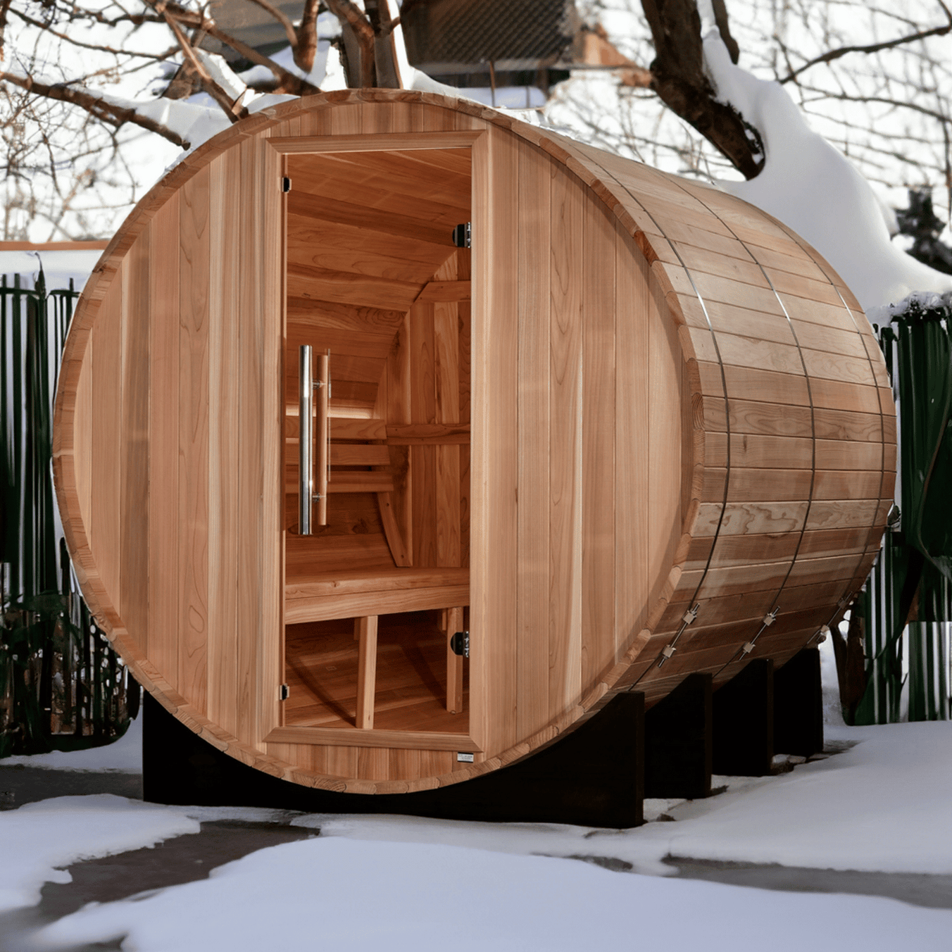 Golden Designs Klosters 6 Person Barrel Sauna GDI-B006-01 featuring outdoor cedar wood construction and traditional cylindrical sauna design for premium relaxation.