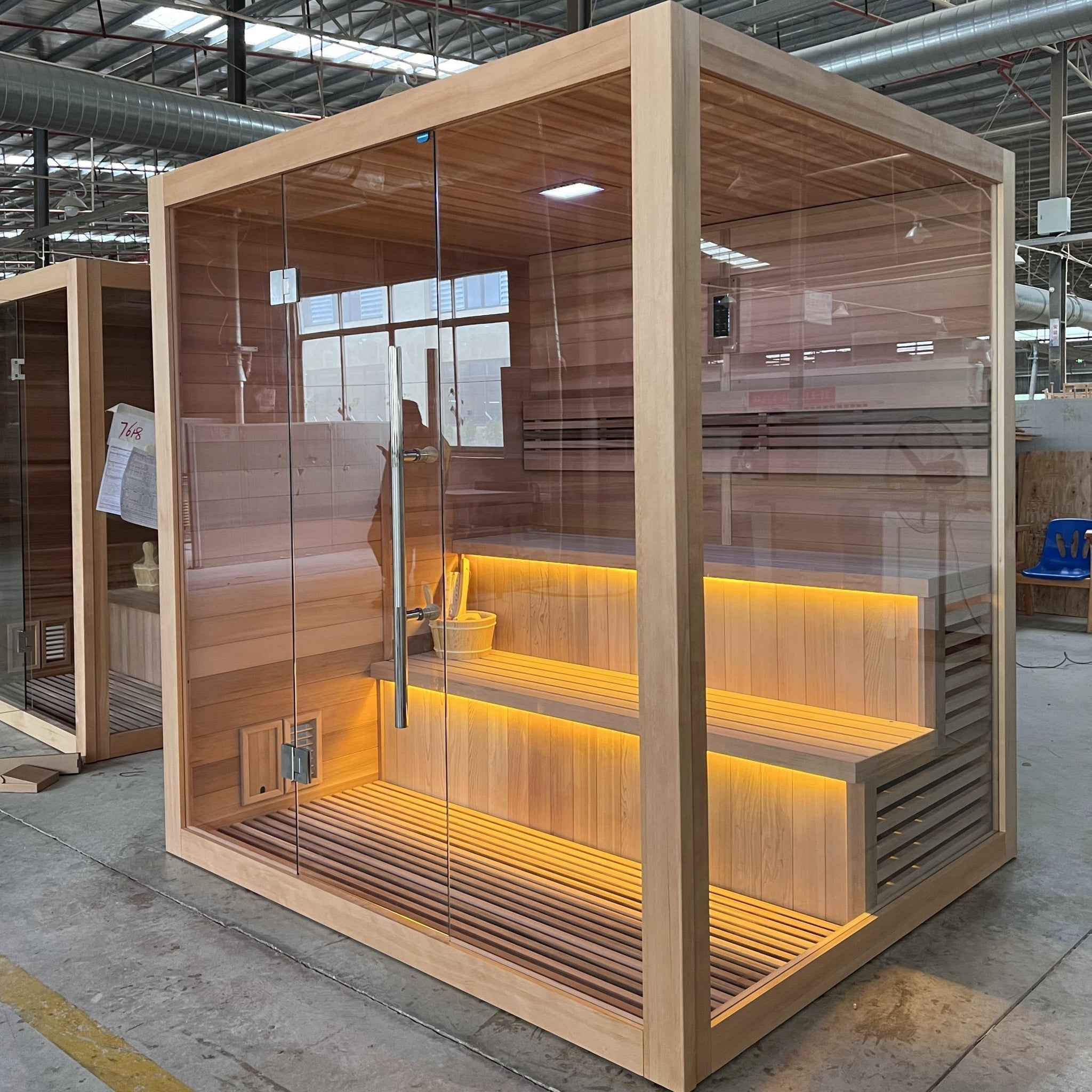 Golden Designs GDI-7206-01 Kuusamo Edition indoor sauna for six people featuring natural cedar wood interior and luxury home relaxation space