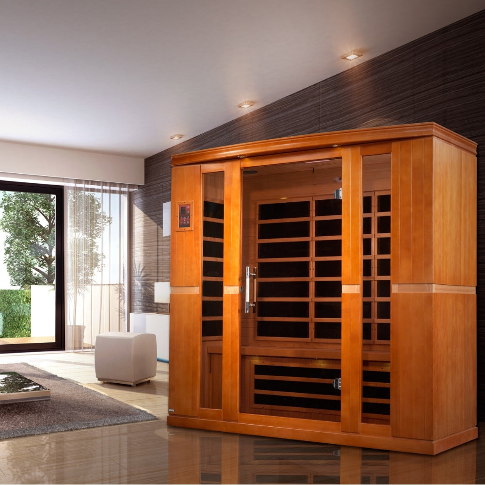 Spacious Dynamic Bergamo infrared sauna interior with warm lighting, Canadian Hemlock wood walls, and Ultra Low EMF infrared heating panels