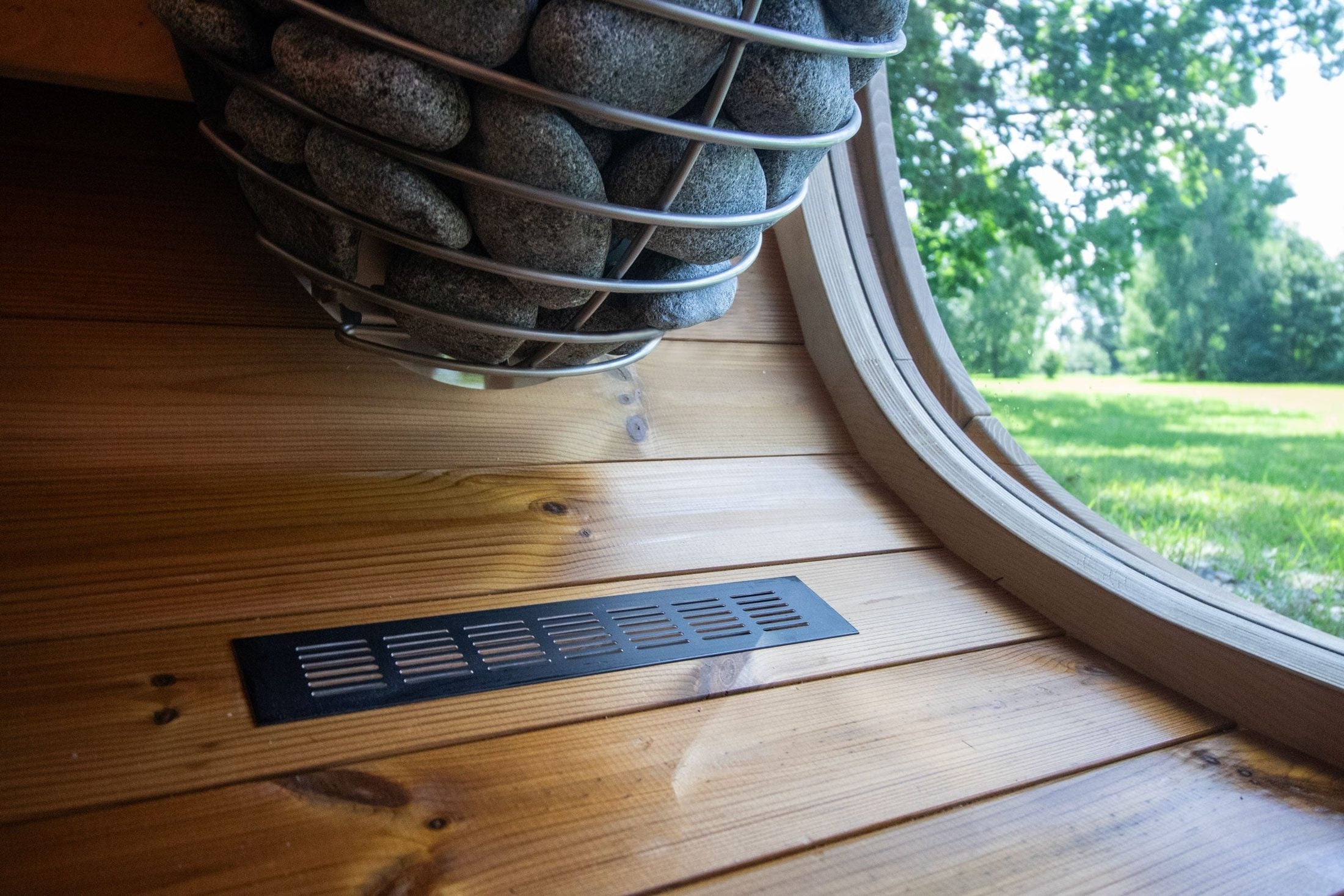 Leil Black Cube Classic backyard sauna retreat, contemporary outdoor wood sauna with elegant black finish, tempered glass, and premium Scandinavian craftsmanship