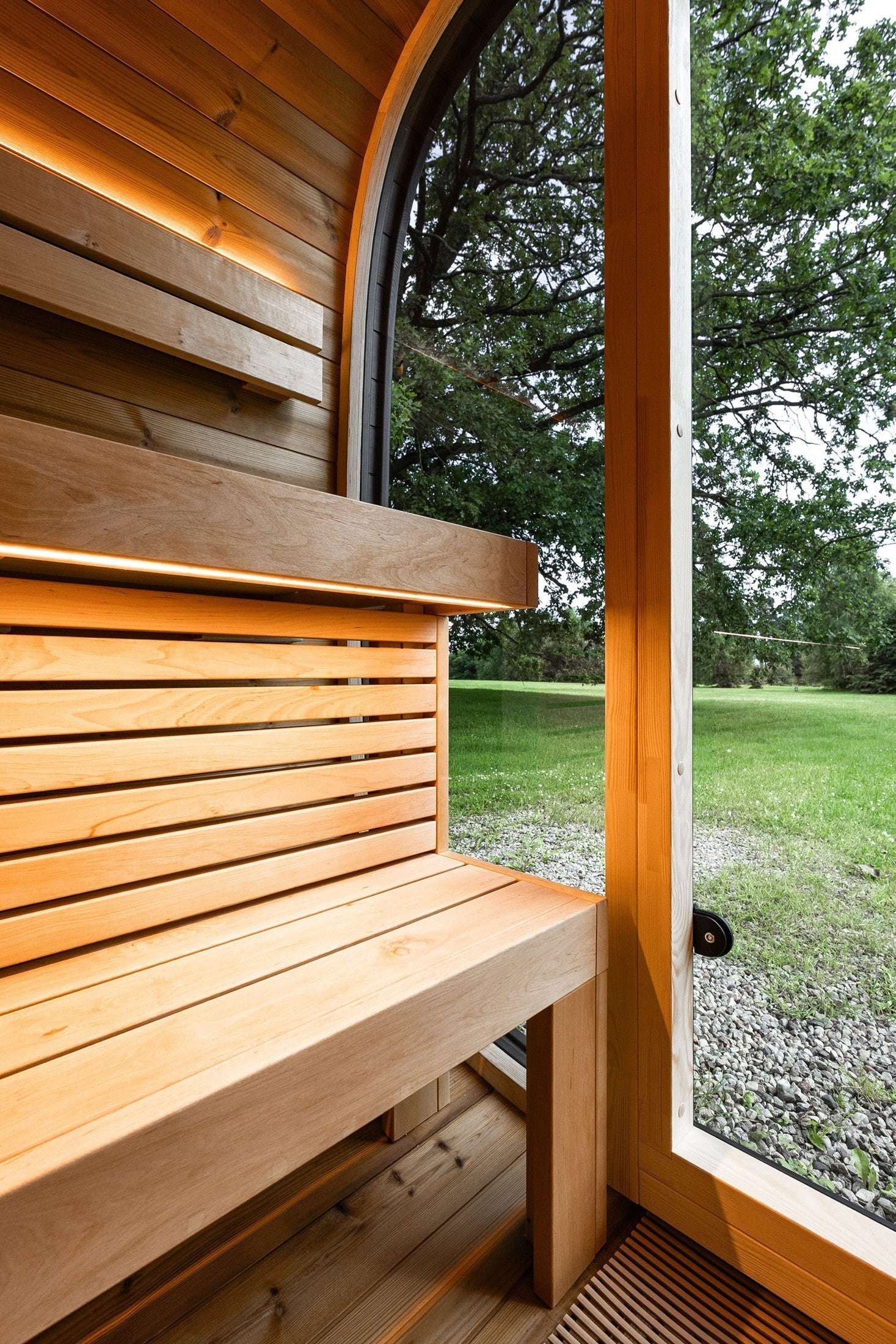 Leil LEIL-BC-6 Outdoor Sauna Kit with premium ThermoWood, spacious social seating arrangement, and sleek black contemporary finish