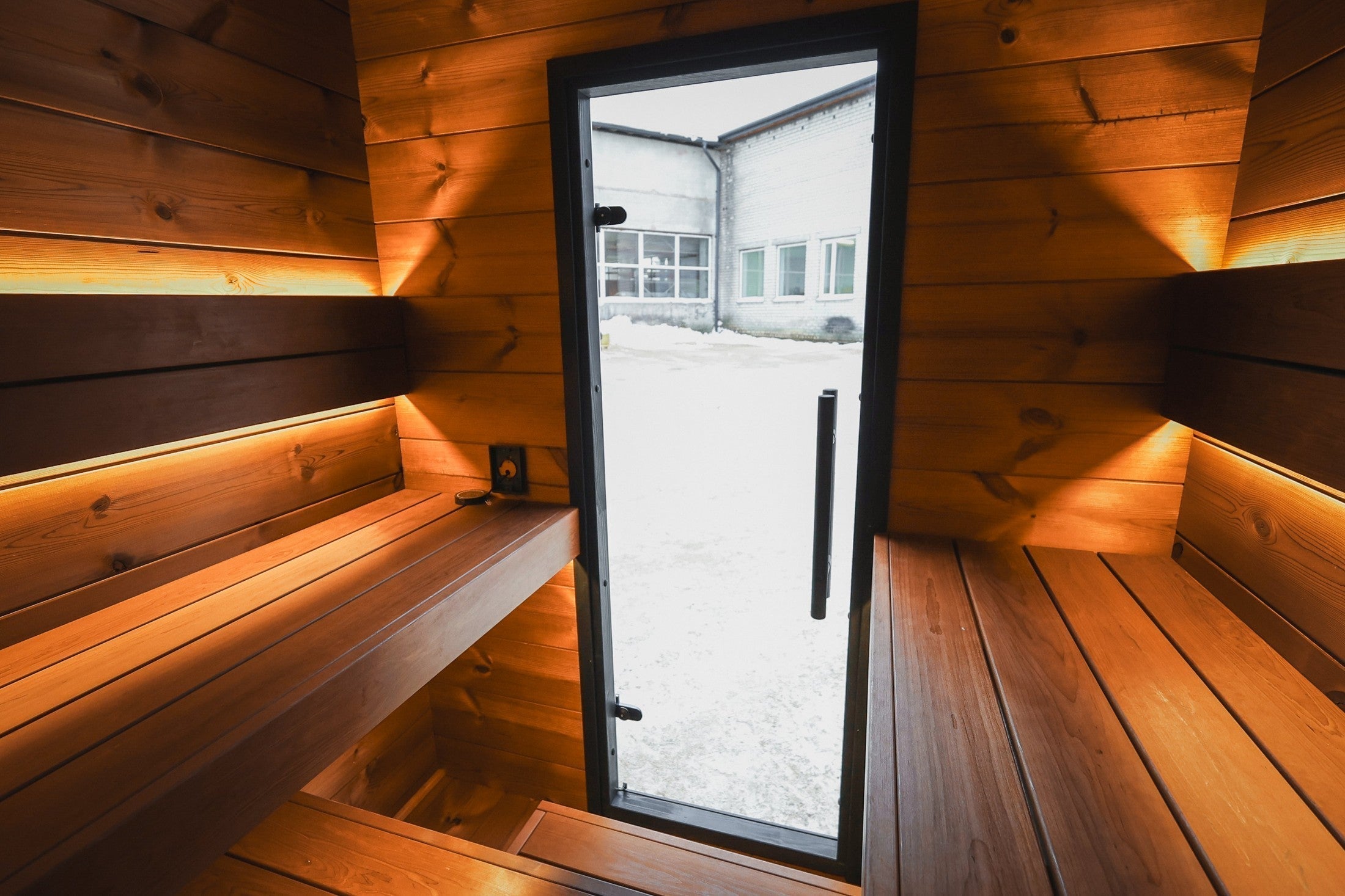 Scandinavian Leil Viva 180 outdoor sauna cabin for 4 persons, durable ThermoWood construction with thermo-alder interior and advanced ventilation design