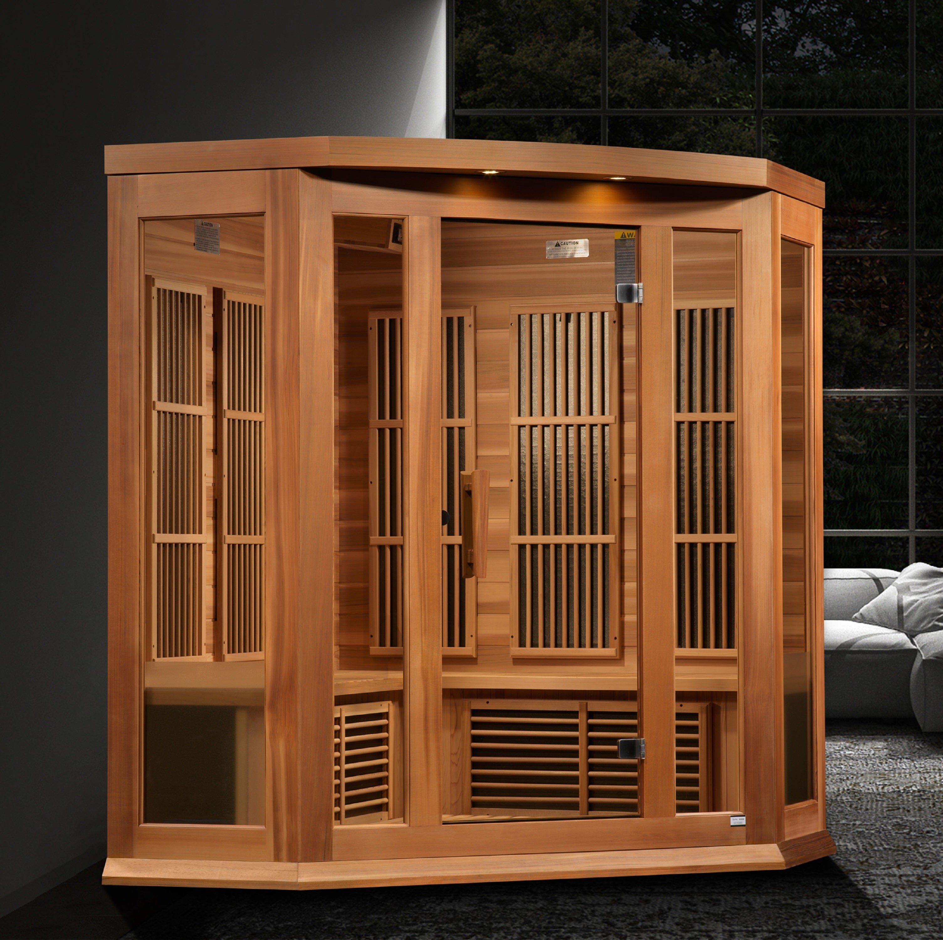 Corner-designed Maxxus MX-K356-01-ZF 3-person infrared sauna featuring PureTech Near Zero EMF technology, red cedar wood construction, and built-in audio entertainment system