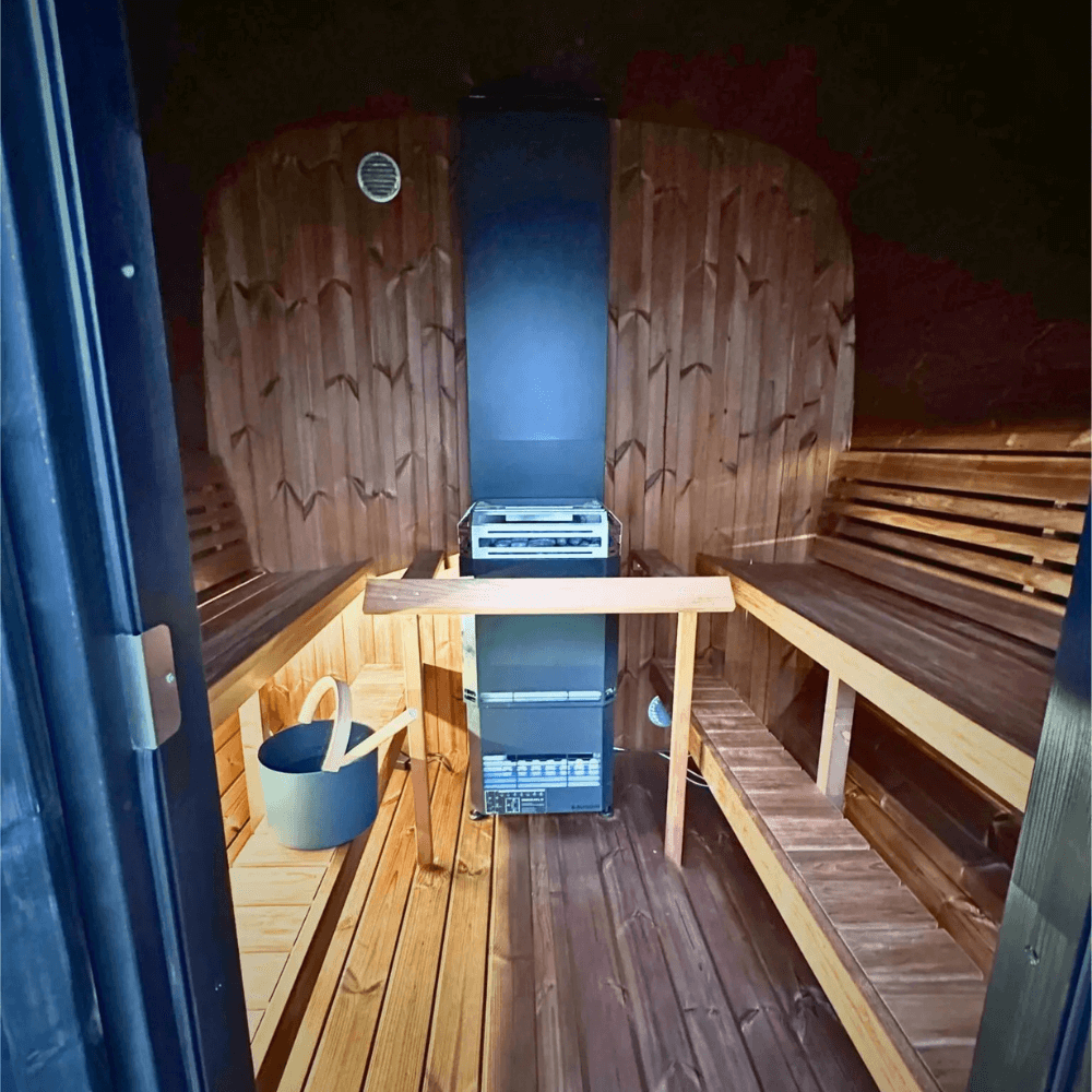 Premium Scandinavian outdoor sauna cabin SaunaLife Model CL7G with full glass front, natural wood construction, and luxury backyard spa design