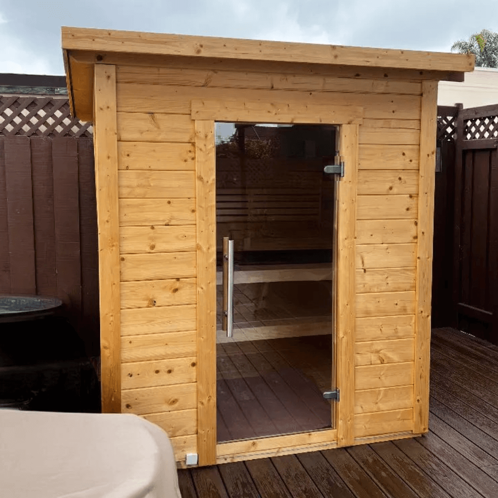 Outdoor SaunaLife G2 4-person sauna kit with heavy-duty spruce panels, V-joint structure and waterproof slanted roof for all-season use