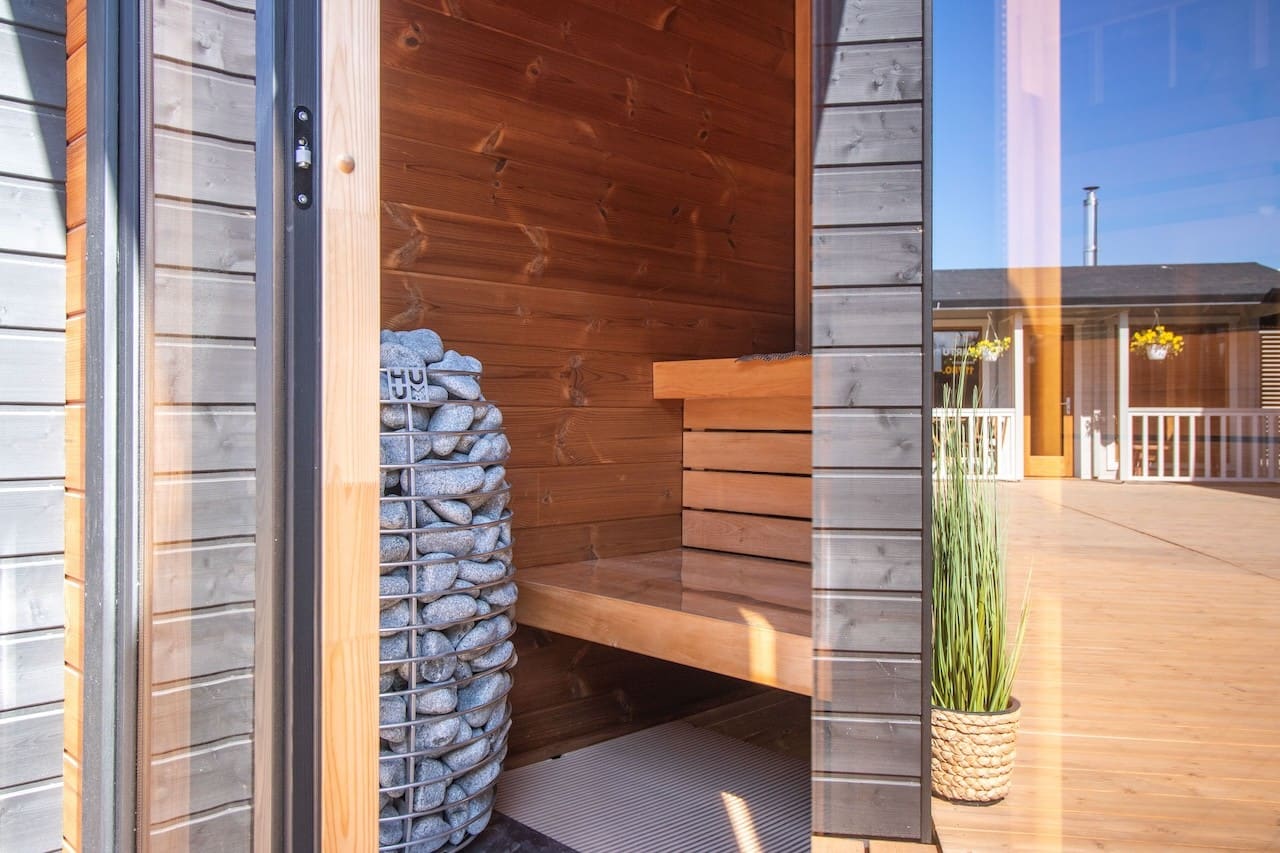 Compact luxury 4 person outdoor sauna Leil Patio XS made of premium wood, backyard sauna for home relaxation and recovery