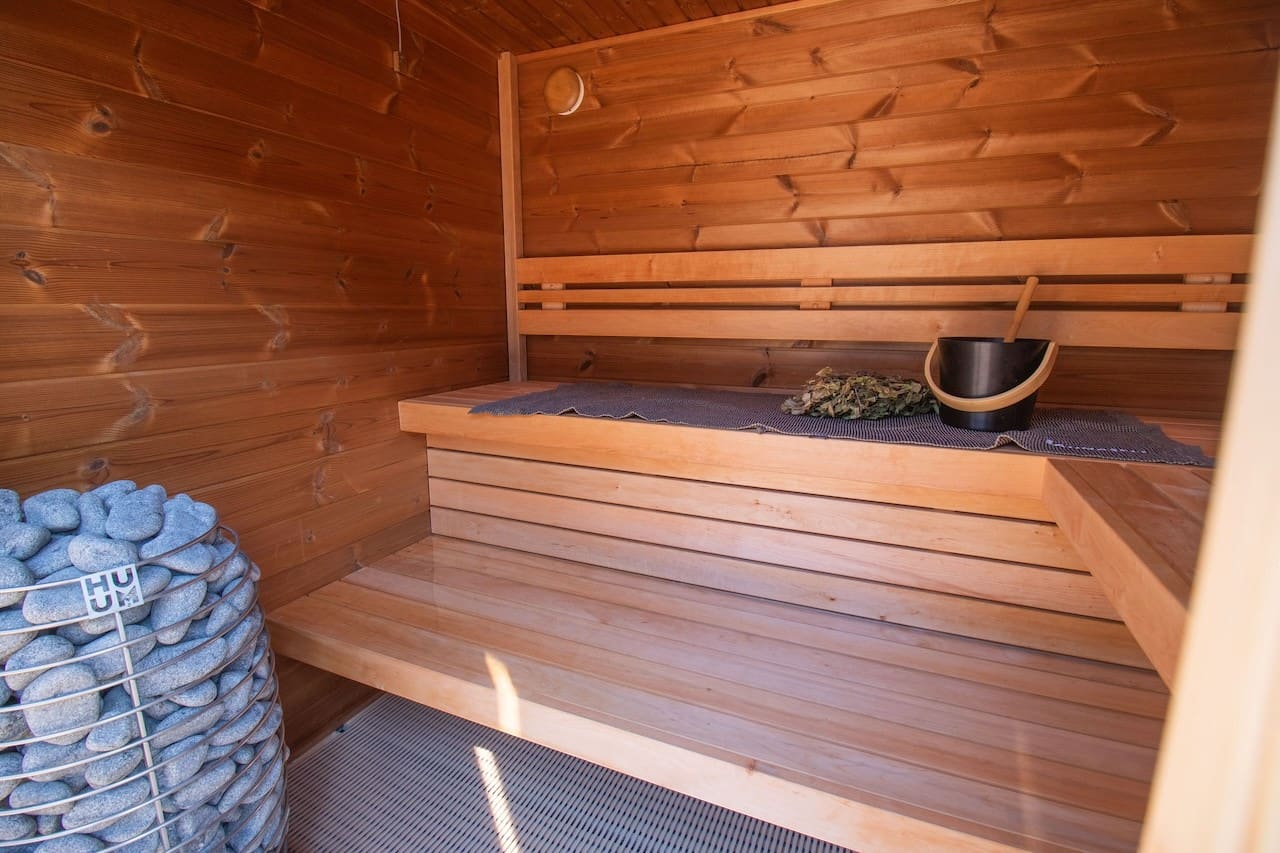 Leil Patio XS 4 person outdoor sauna kit crafted in premium wood, compact modern backyard sauna for home spa and wellness relaxation